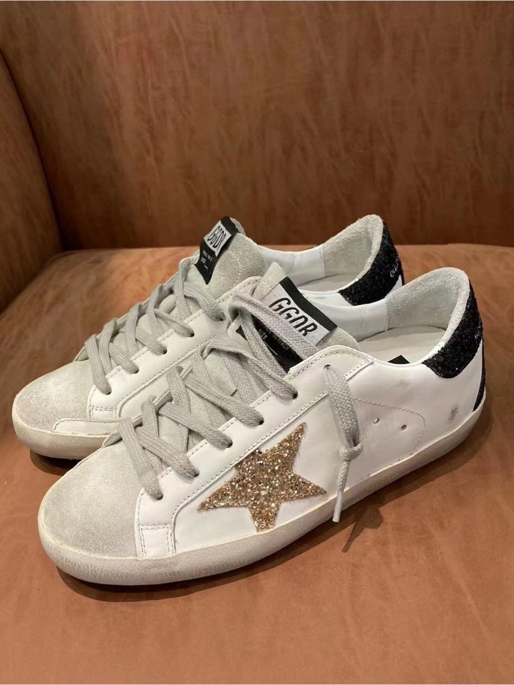 Golden Goose White Sneakers with Gold Glitter Star and Black Heel Tab